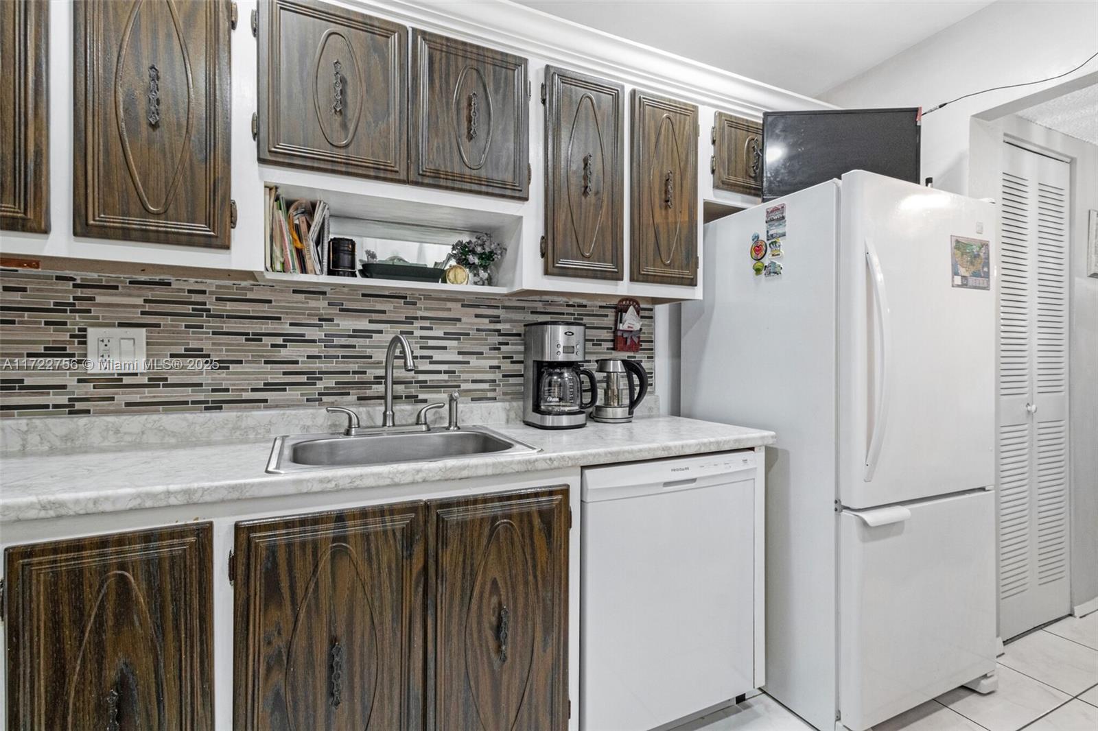 f3b61b38-71 4000 NW 44th Ave # 205, Lauderdale Lakes FL 33319 — #A11722756